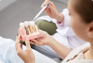 Young girl examining teeth in office focusing on dental health